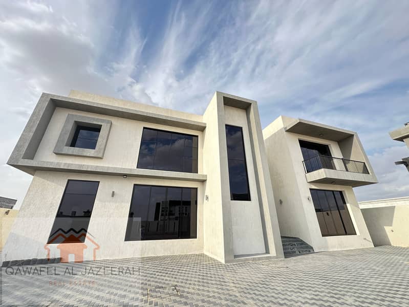 BRAND NEW LUXURY VILLA IN AL AWIR    5 bedrooms  2 halls  1 living  1 dining  1 kitchen  garden     store  laundry  parking  kids play area   very nic