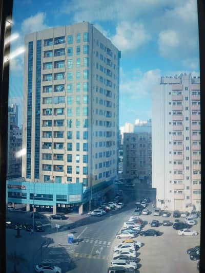 For annual rent in Ajman, two rooms, a hall, a kitchen, 3 bathrooms, and a balcony in Al Rashidiya, at a price of 40, with free air conditioning and f