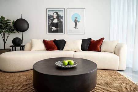 1 Bedroom Flat for Rent in Business Bay, Dubai - living room 2. jpeg