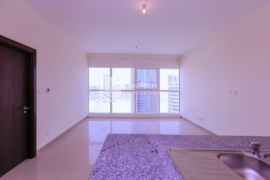 11 1-bedroom-apartment-al-reem-island-city-of-lights-sigma-tower-2-living-dining. JPG