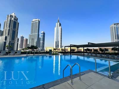 فلیٹ 2 غرفة نوم للايجار في وسط مدينة دبي، دبي - شقة في برج رويال،وسط مدينة دبي 2 غرف 169999 درهم - 8425429