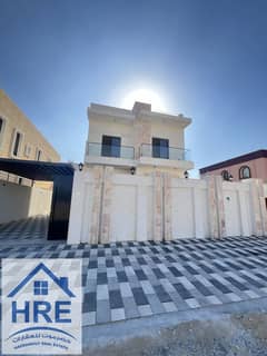 Two villas for sale in Al Mowaihat 3, Khan Sahib The second piece of Al-Qar Street, a completely new stone facade, the first resident