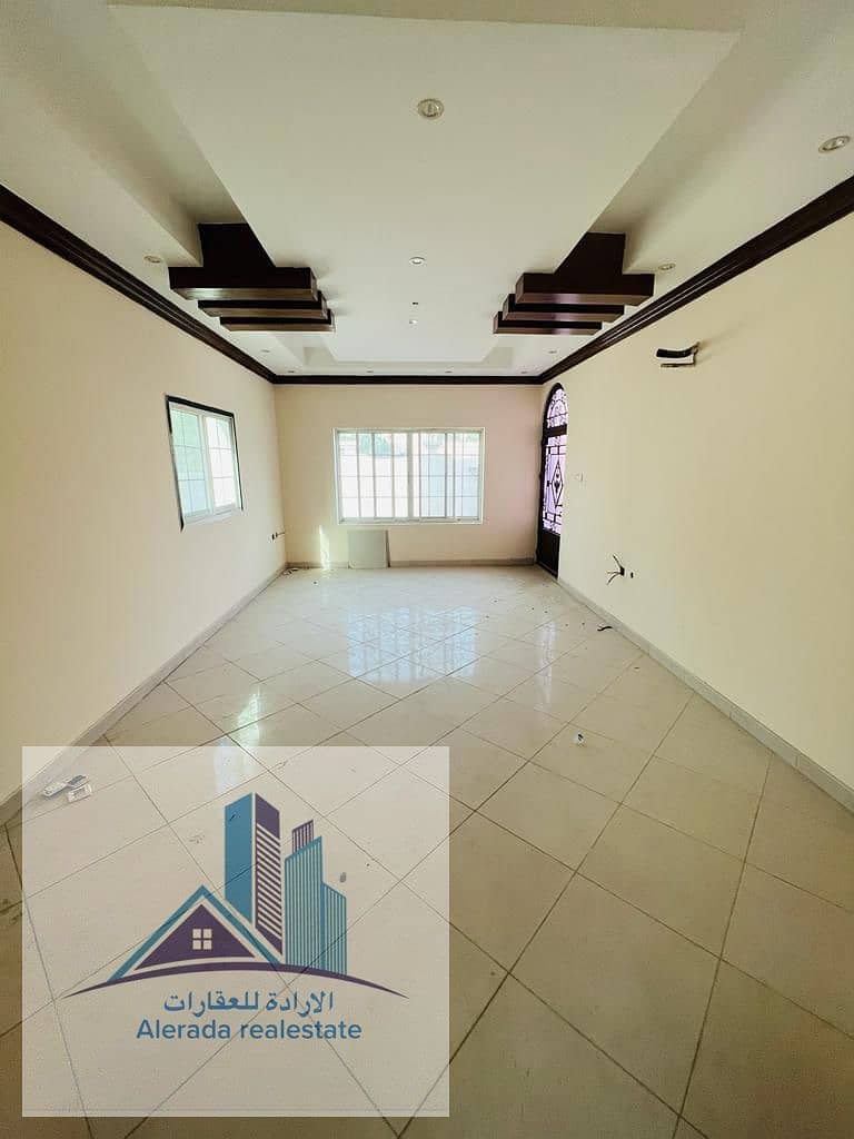 Villa for sale in Ajman, a corner on two streets, a large area