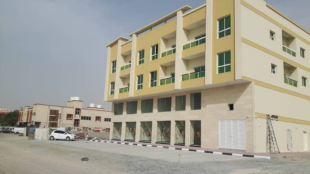 a commercial building suitable for hotel apartments in  AJMAN FOR SALE.