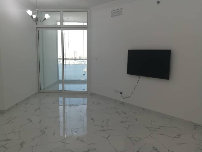 PAY AED 36000 BUY 2 BHK APARTMENT IN OASIS TOWER