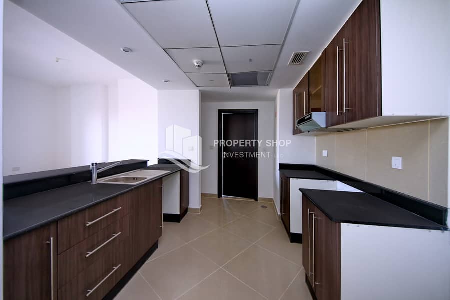 9 3-bedroom-apartment-abu-dhabi-al-reef-downtown-kitchen-1. JPG