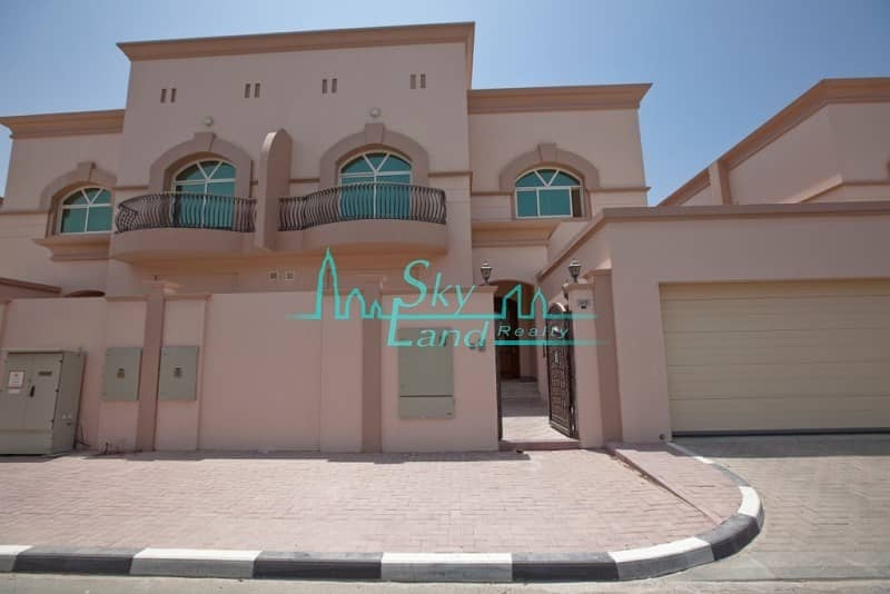 STUNNING 5BR+MAID'S VILLA WITH GARDEN IN COMPOUND WITH POOL