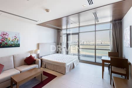 Studio for Rent in Dubai Sports City, Dubai - Vacant | Balcony with Lake View | Upgraded