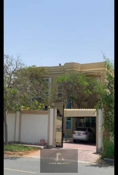 Villa for sale in Al Nouf area in Sharjah, a great location opposite Al Qarayen Park