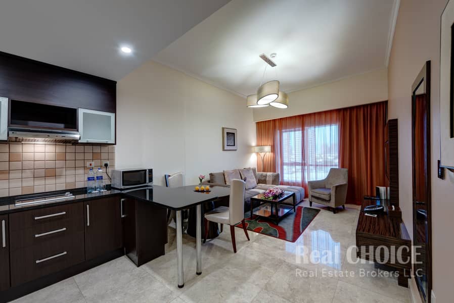 3 Ghaya Grand Hotel Dubai - Two Bedroom Living Room. jpg