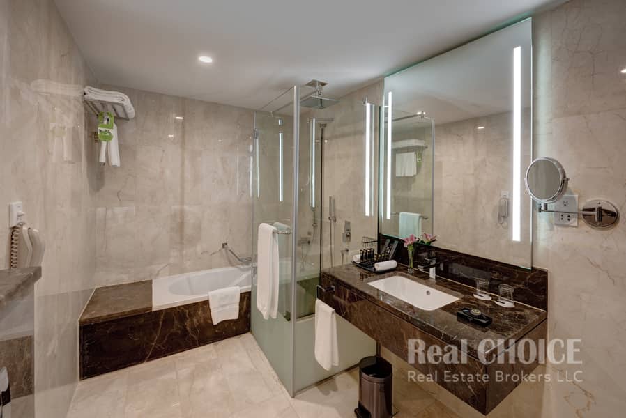 8 Ghaya Grand Hotel Dubai - Two Bedroom Bathroom 5. jpg