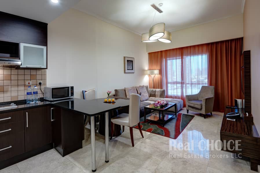 2 Ghaya Grand Hotel Dubai  - One Bedroom Living Room. jpg