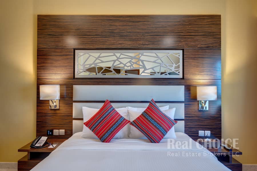 5 Ghaya Grand Hotel Dubai - Studio bed. jpg