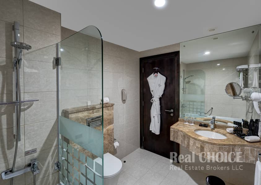 5 Ghaya Grand Hotel Dubai- Two Bedroom Bathroom 2. jpg