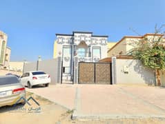 For sale, a villa with a European design and personal finishing in Al Mowaihat, a prime location close to all services, freehold for all nationalities