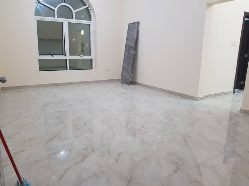 BRAND NEW. First floor and living room for rent in the city of Khalifa (A) first floor with a balcony