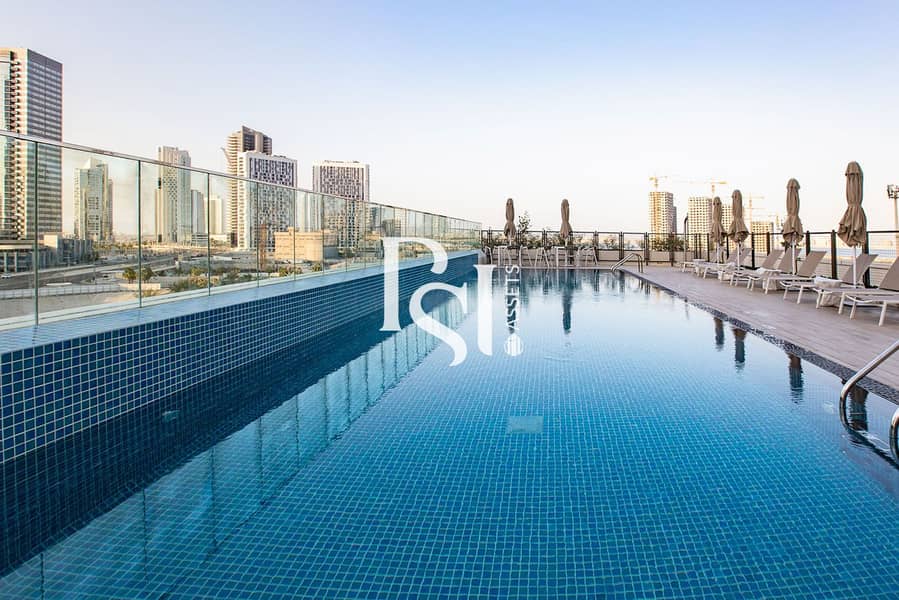 12 Reflection Tower-Shams-Abu-Dhabi-Al-Reem-Island-Pool-area. jpg