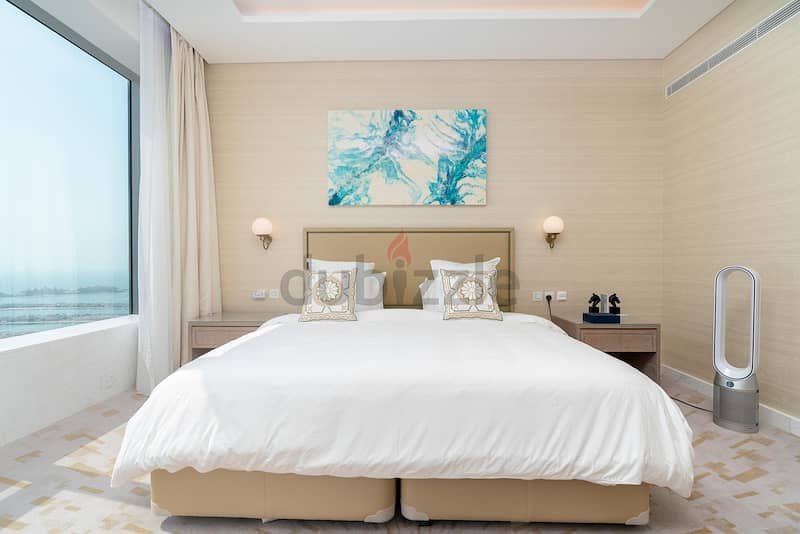 Luxurious 1BR Oasis in Palm Tower, Palm Jumeirah: Unveiling Elegance and Serenity