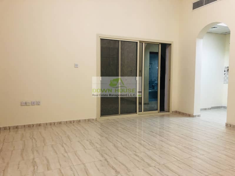 Brand new big studio flat w/ balcony in Khalifa city (A) .