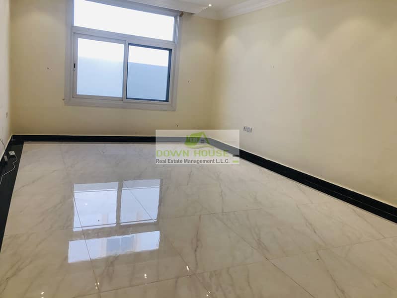 Huge 1- bedroom hall with private entrance in khalifa city A .  (SHARED SWIMMING POOL)