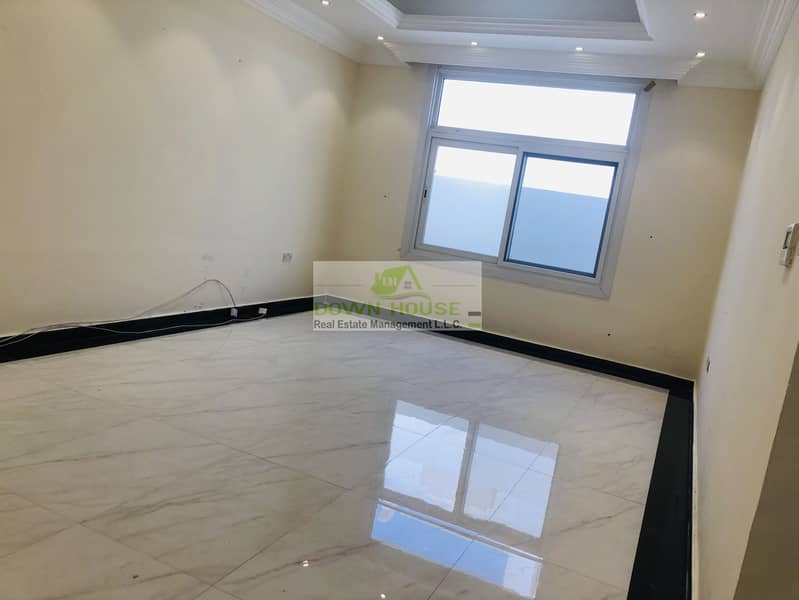 3 Huge 1- bedroom hall with private entrance in khalifa city A .  (SHARED SWIMMING POOL)