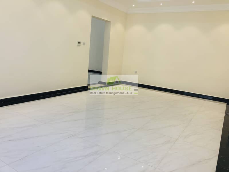 4 Huge 1- bedroom hall with private entrance in khalifa city A .  (SHARED SWIMMING POOL)