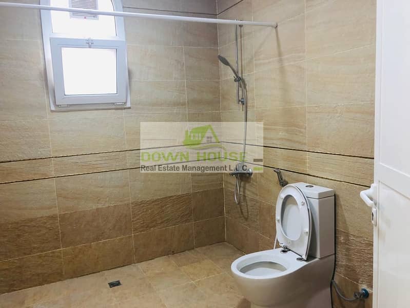 9 Neat huge Studio flat in Khalifa city A . Shared swimming pool .