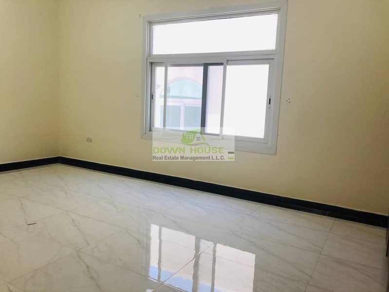 7 Huge 1- bedroom hall with private entrance in khalifa city A .  (SHARED SWIMMING POOL)