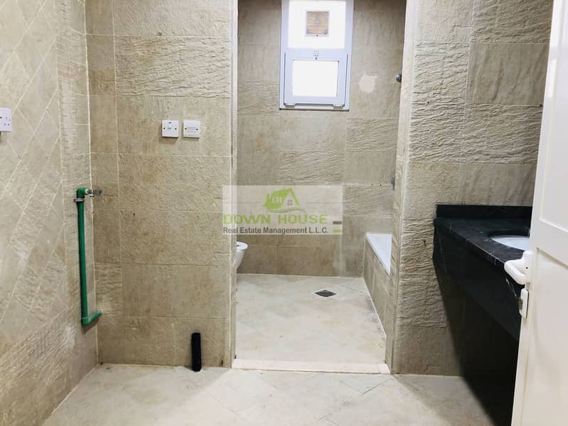 10 Huge 1- bedroom hall with private entrance in khalifa city A .  (SHARED SWIMMING POOL)
