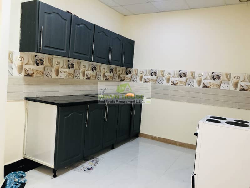 12 Huge 1- bedroom hall with private entrance in khalifa city A .  (SHARED SWIMMING POOL)
