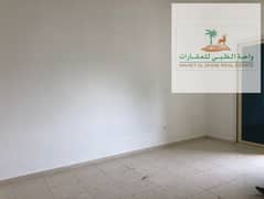 An apartment for annual rent, two rooms, a hall, and 2 bathrooms, a large area, a prime location, quick to the Dubai exit