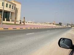 residential land in al manama only 130 k including fees . 