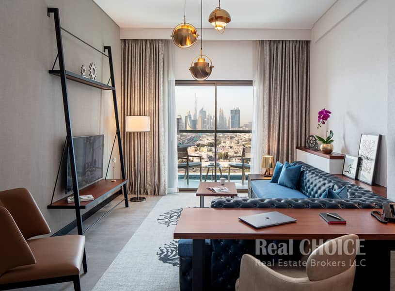 2 Apartments Living Room Burj View K1ALP1. jpg