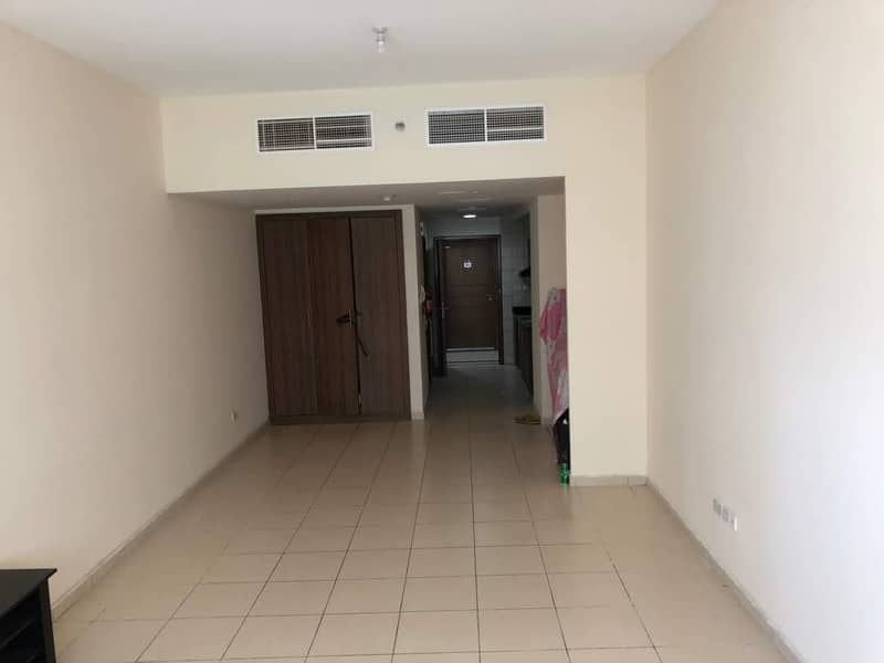 studio with free parking partial city view in Ajman one tower for sale