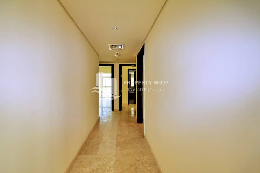11 3-bedroom-apartment-al-reem-island-marina-square-ocean-terrace-corridor. JPG