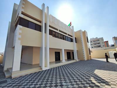 8 Bedroom Villa for Rent in Al Rumaila, Ajman - Villa for rent in Ajman, Al Rumaila area, 8 rooms, a sitting room and a hall
