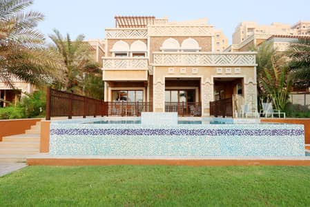 5 Bedroom Villa for Rent in Palm Jumeirah, Dubai - Sea-View Oasis: 4BR w/ Maids Villa with Jacuzzi Game Room by Livbnb