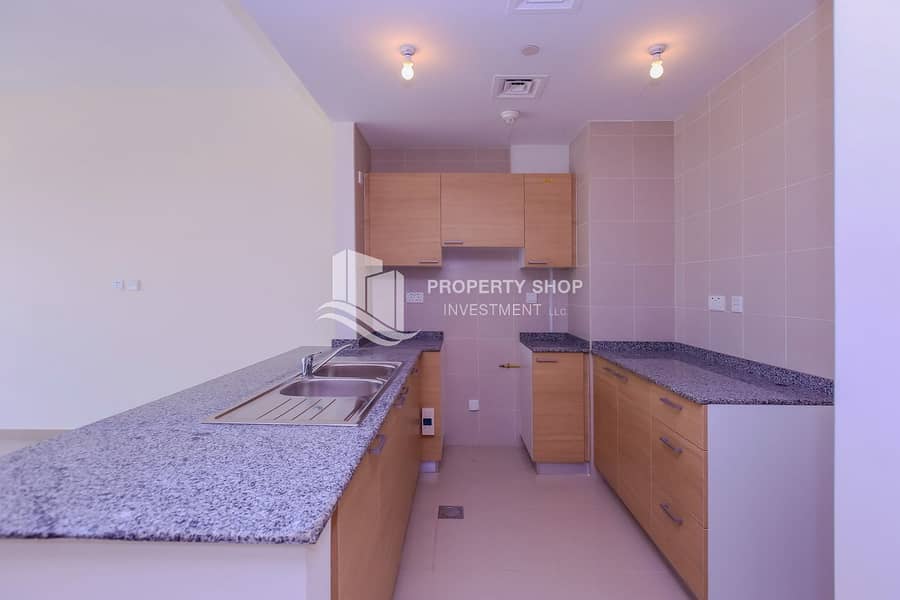 3 1-bedroom-apartment-al-reem-island-city-of-lights-sigma-tower-2-kitchen-1. JPG