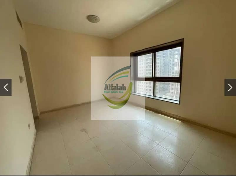 With Parking 2-Bedroom Apartment for sale in Paradise Lake Tower, Ajman