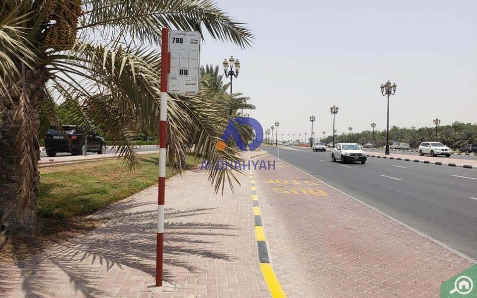 3 Bus-stop-in-Al-Falaj-AR. jpg