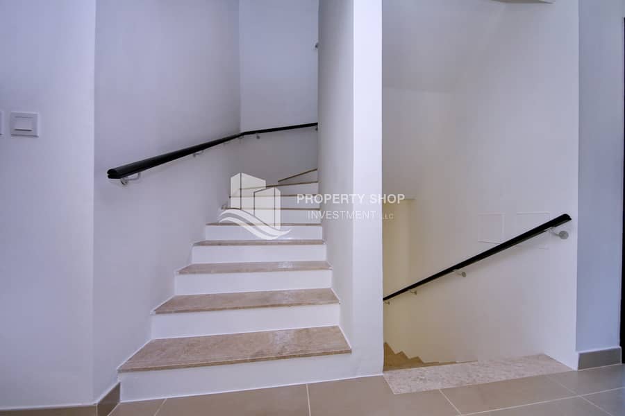 3 5-bedroom-villa-abu-dhabi-al-reef-contemporary-village-stairs. JPG