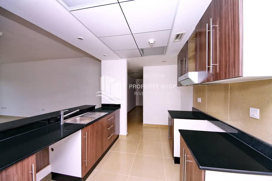 4 1-bedroom-apartment-abu-dhabi-al-reef-downtown-kitchen-1. JPG