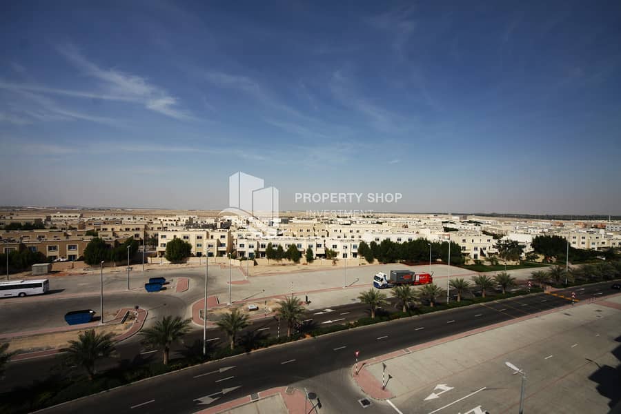 22 3-bedroom-apartment-abu-dhabi-al-reef-downtown-view from-balcony-1. JPG