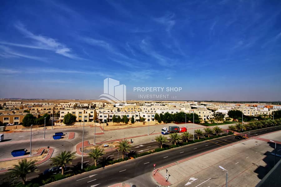 23 3-bedroom-apartment-abu-dhabi-al-reef-downtown-view from-balcony. JPG