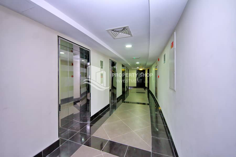 13 3-bedroom-apartment-abu-dhabi-al-reef-downtown-elevator. JPG
