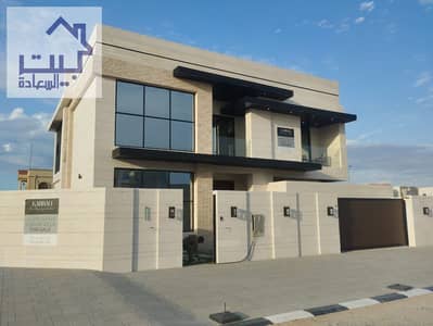 For sale in Ajman, Al Rawda 1 villa Five master rooms, a sitting room, a hall, and two servant rooms The villa is equipped with all electrical applian