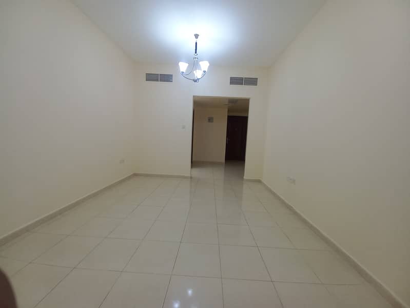 Chepest Bright Spacious 1BHK With Covered Parking Near Muwailih Park