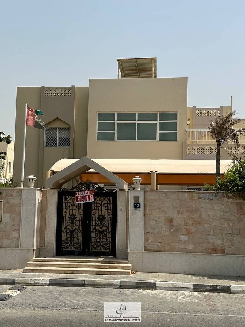 For sale, a two-storey villa in the Al Khalidiya suburb of Sharjah The area is 11000 square feet The location of the villa is behind the Ewan Hotel, the second piece of Sharqa Corniche 8 BHK