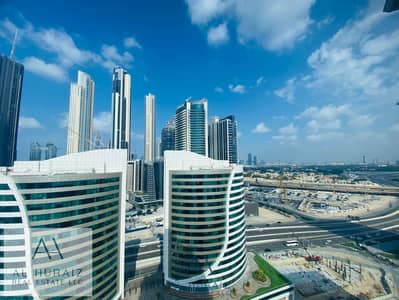 مکتب  للايجار في الخليج التجاري، دبي - مکتب في برج بي تو بي،الخليج التجاري 85000 درهم - 8572568