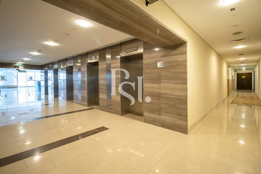 10 addax-tower-offices-city-of-lights-al-reem-island-elevator-hallway (1). jpg